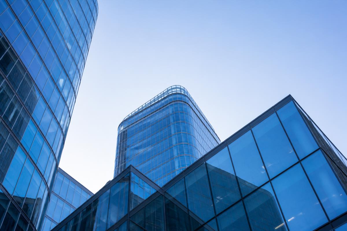 Modern glass office towers in a corporate business district
